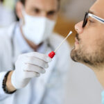 man having pcr medical test from a doctor
