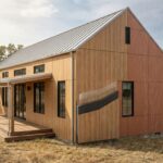 Farmhouse exterior with HPL cladding panels showing wood finish and weather-resistant performance in rural outdoor conditions